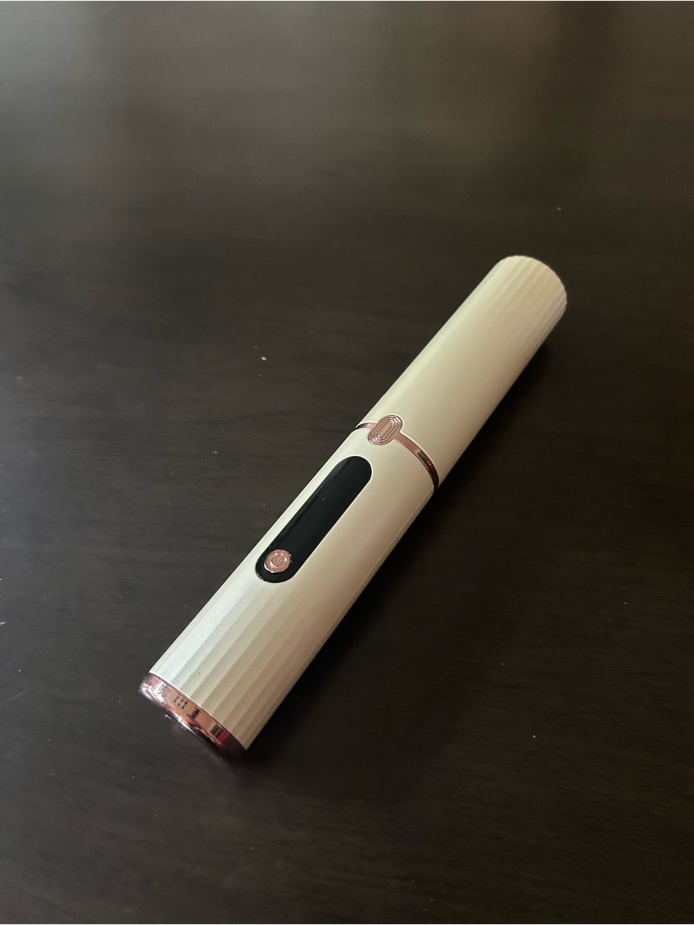 Portable cordless heated brush / straightener